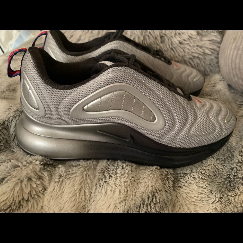Nike black and silver 720
